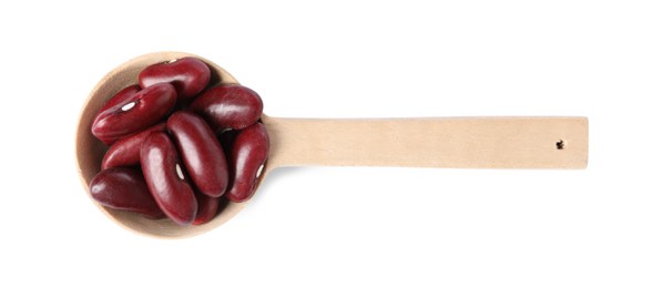 Photo of Dried red beans in spoon isolated on white, top view