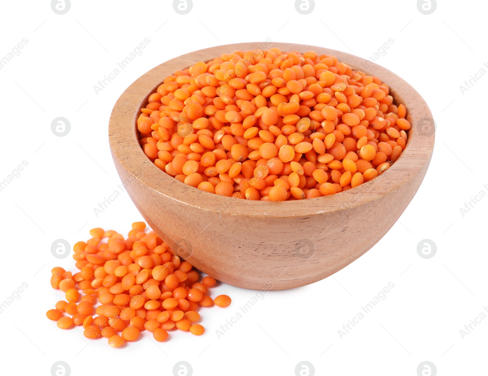 Photo of Raw lentils in bowl isolated on white