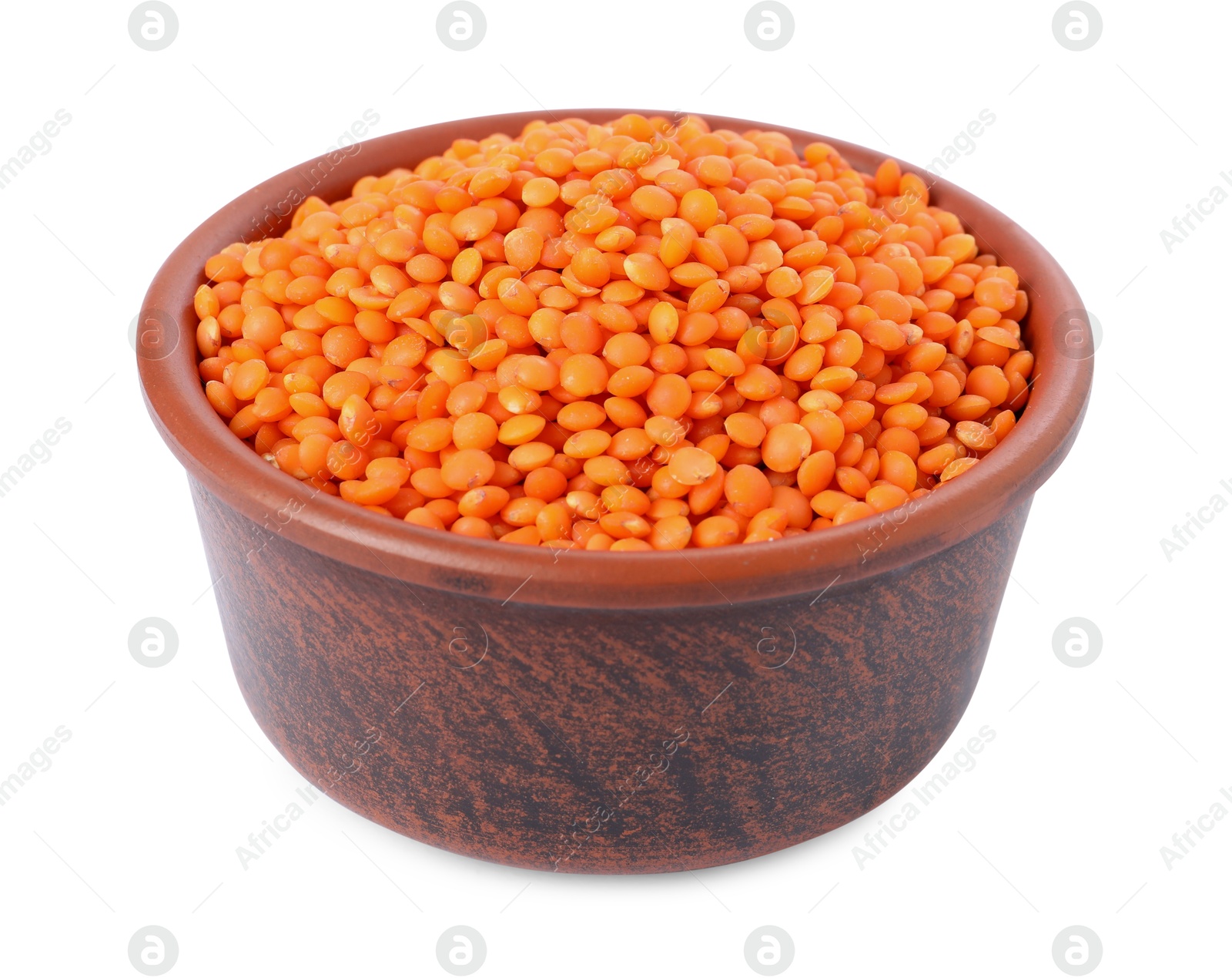 Photo of Raw lentils in bowl isolated on white