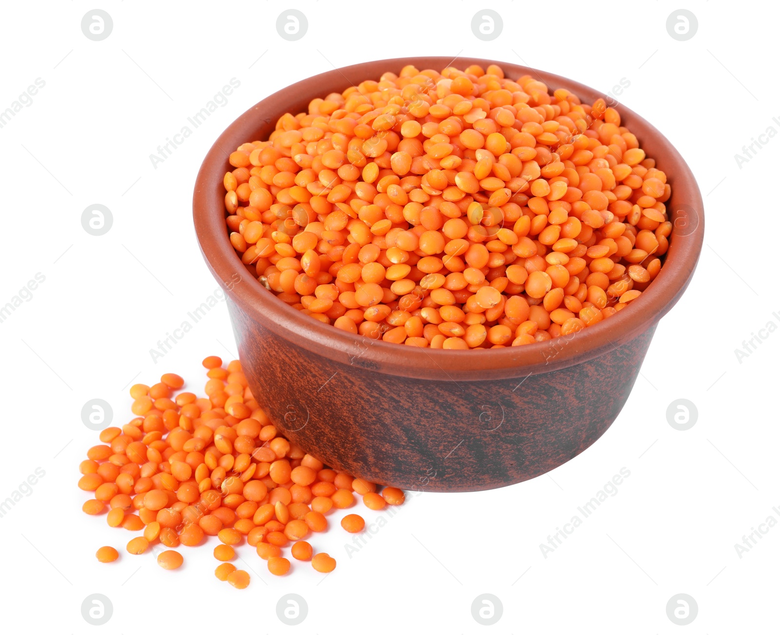 Photo of Raw lentils in bowl isolated on white