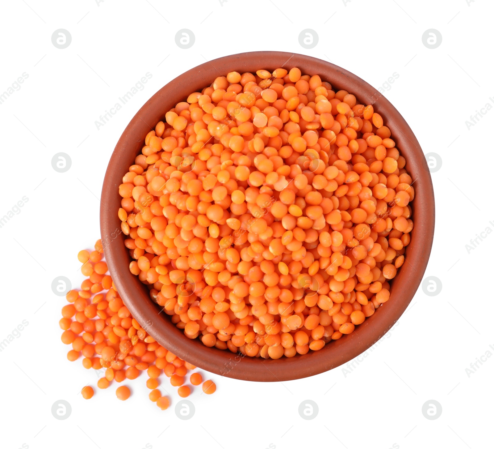 Photo of Raw lentils in bowl isolated on white, top view