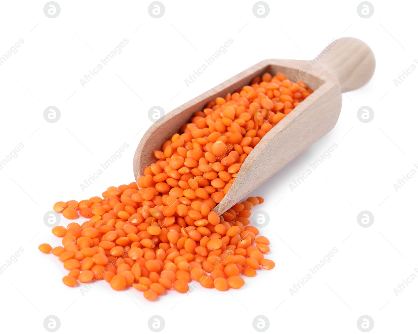 Photo of Raw lentils in scoop isolated on white