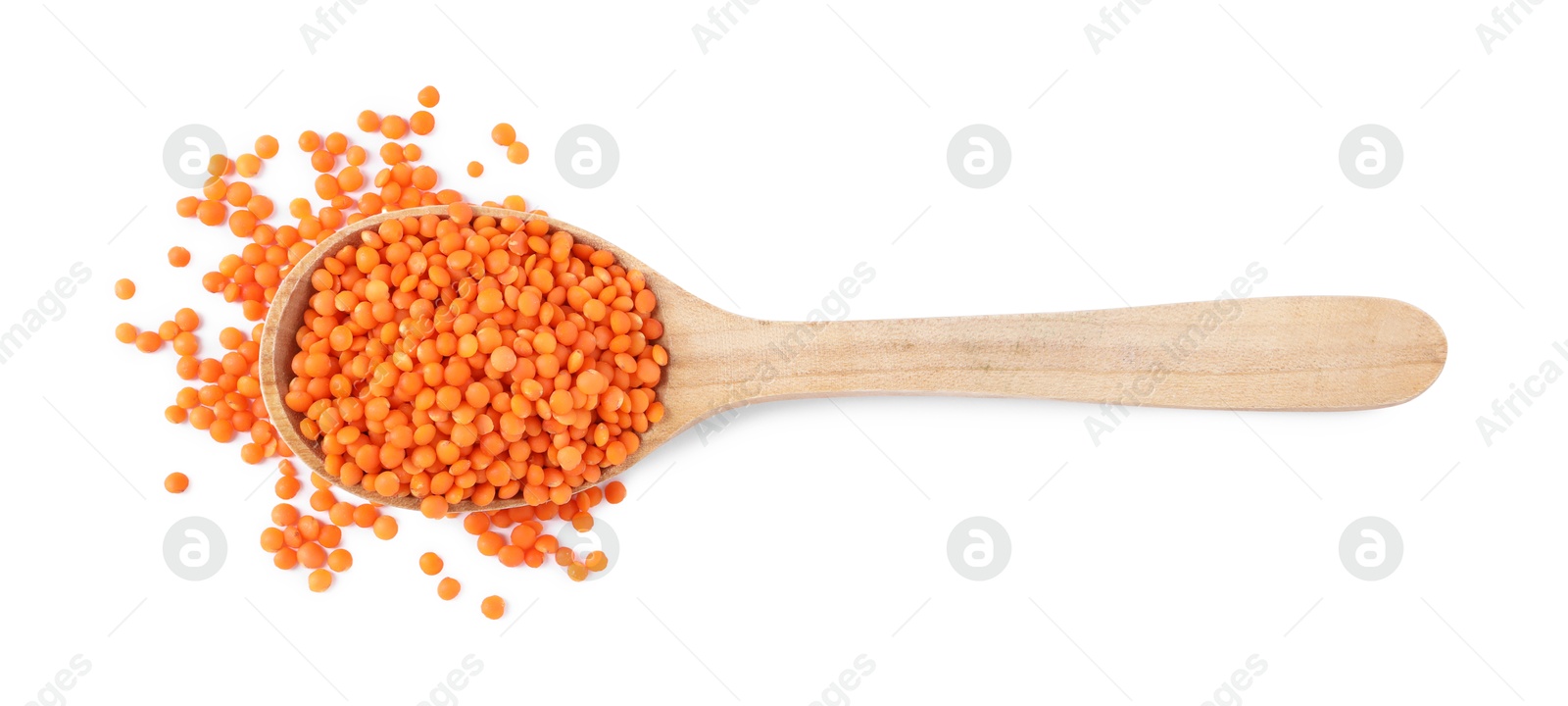 Photo of Raw lentils in spoon isolated on white, top view