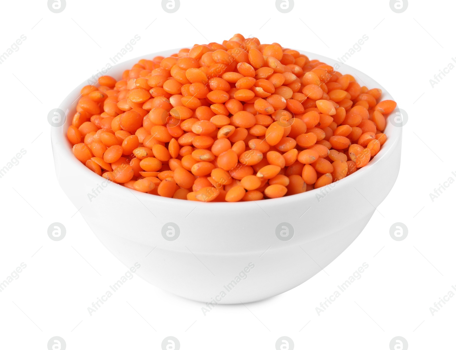 Photo of Raw lentils in bowl isolated on white