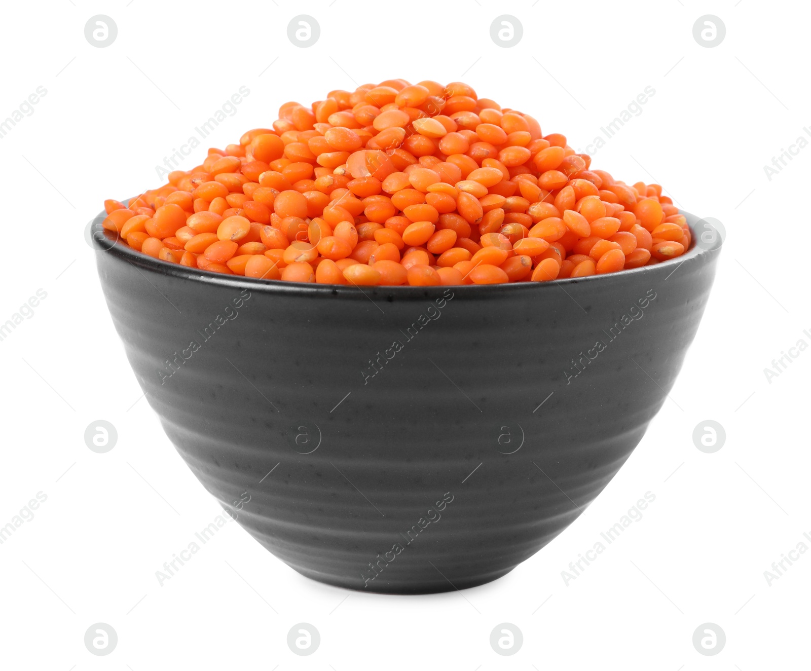 Photo of Raw lentils in bowl isolated on white