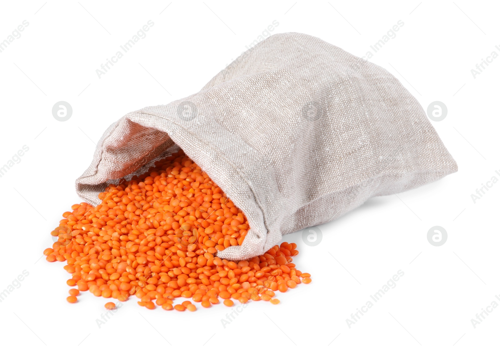 Photo of Raw lentils in burlap isolated on white