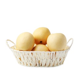 Photo of Delicious fresh apple pears in wicker basket isolated on white