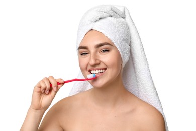 Beautiful woman brushing her teeth on white background