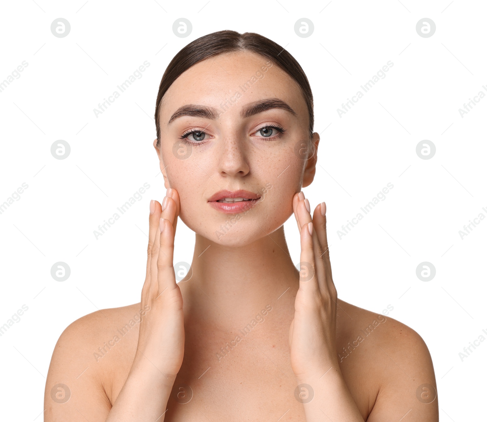 Photo of Face massage. Beautiful young woman on white background