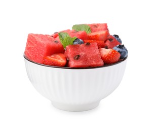 Photo of Pieces of tasty watermelon, strawberries, blueberries and mint in bowl isolated on white