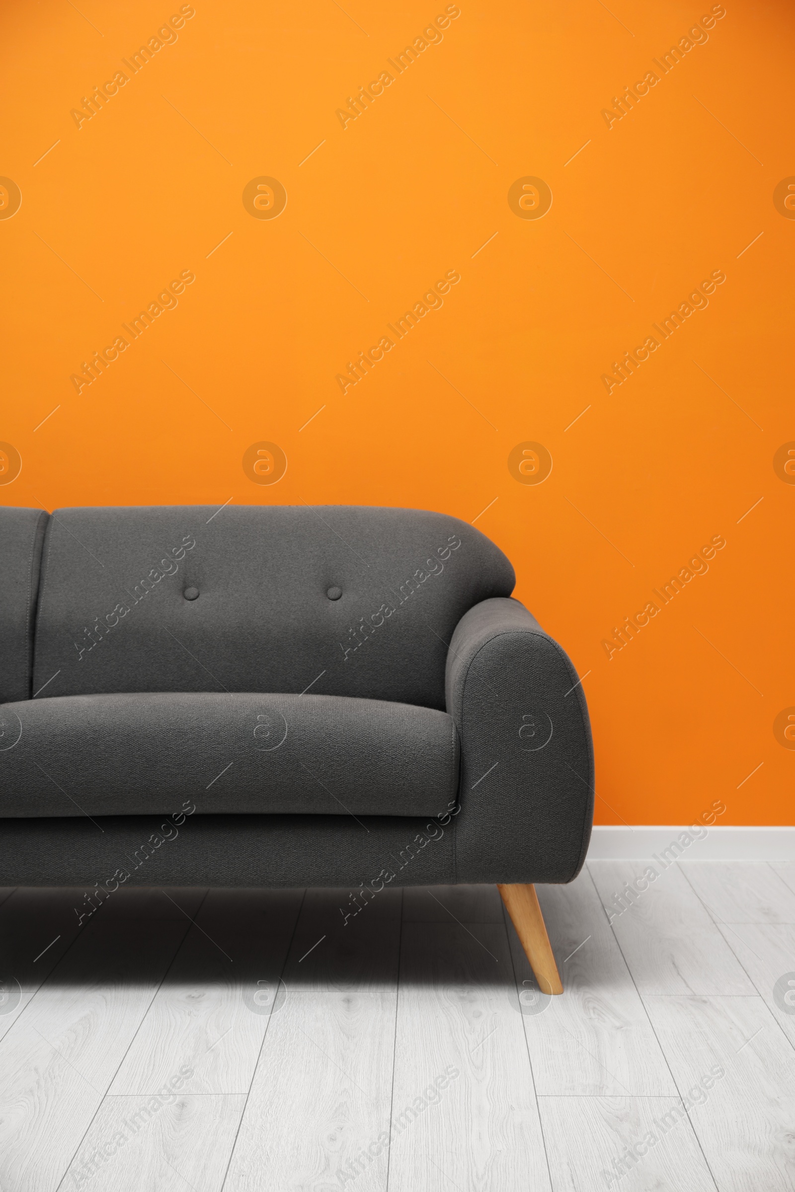 Photo of Stylish sofa in living room. Interior design