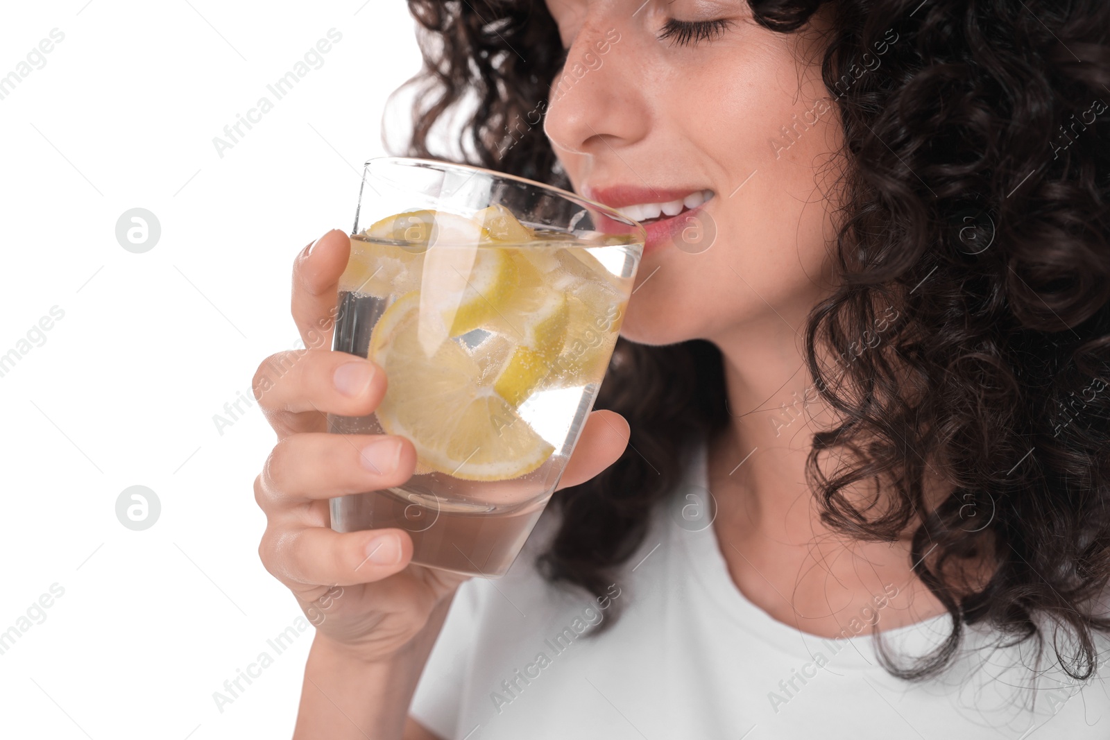 Photo of Woman drinking water with lemon on white background, closeup