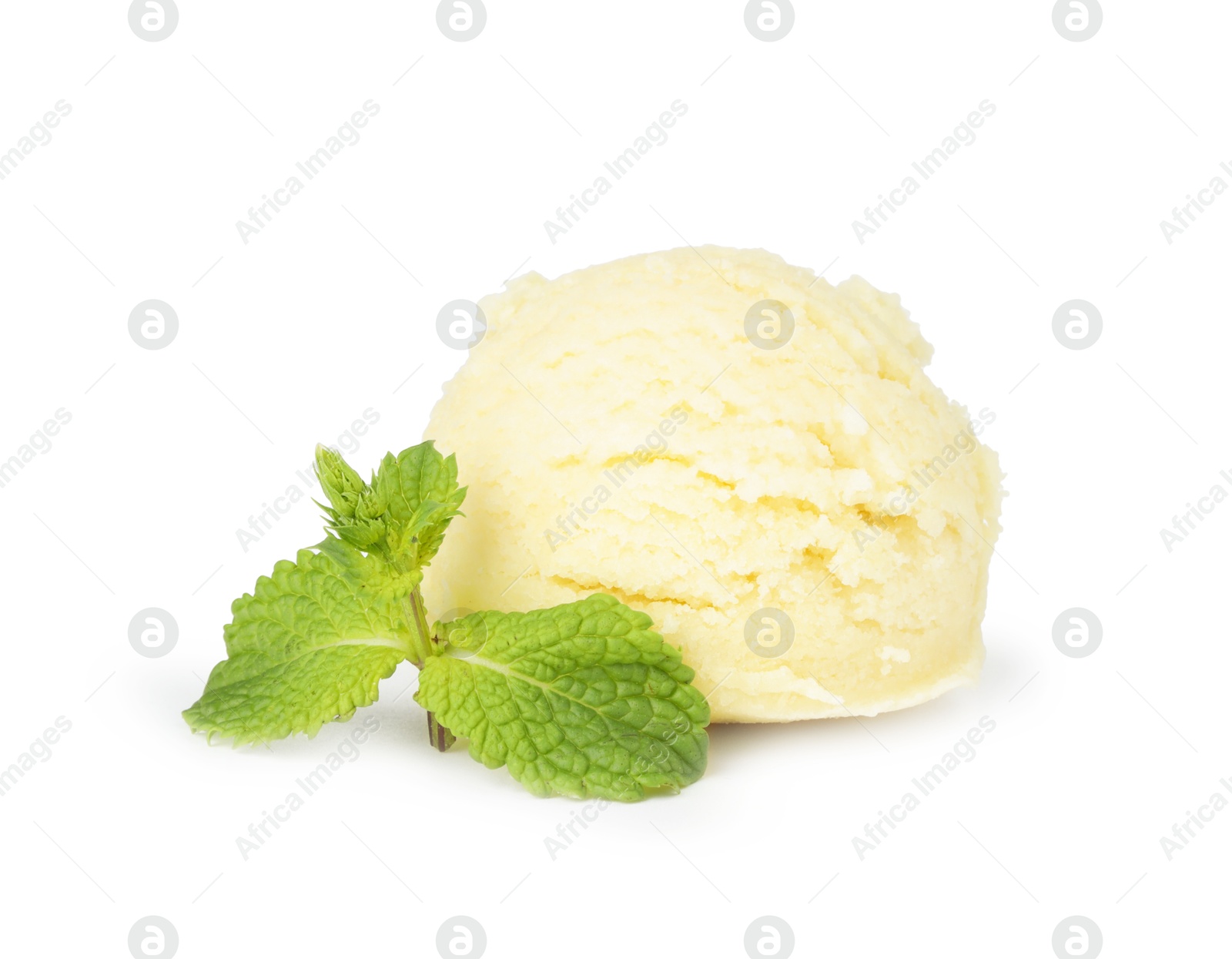 Photo of Scoop of melon sorbet and mint isolated on white