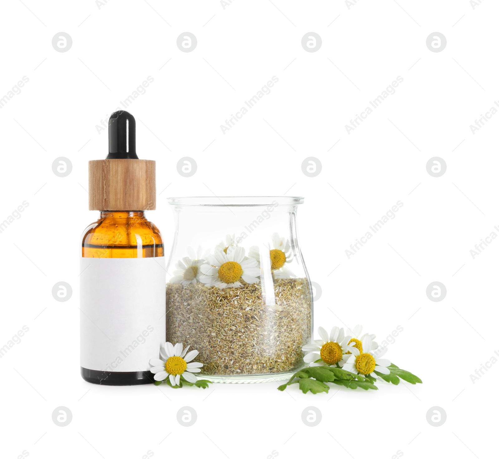 Photo of Bottle of tincture and daisy flowers isolated on white