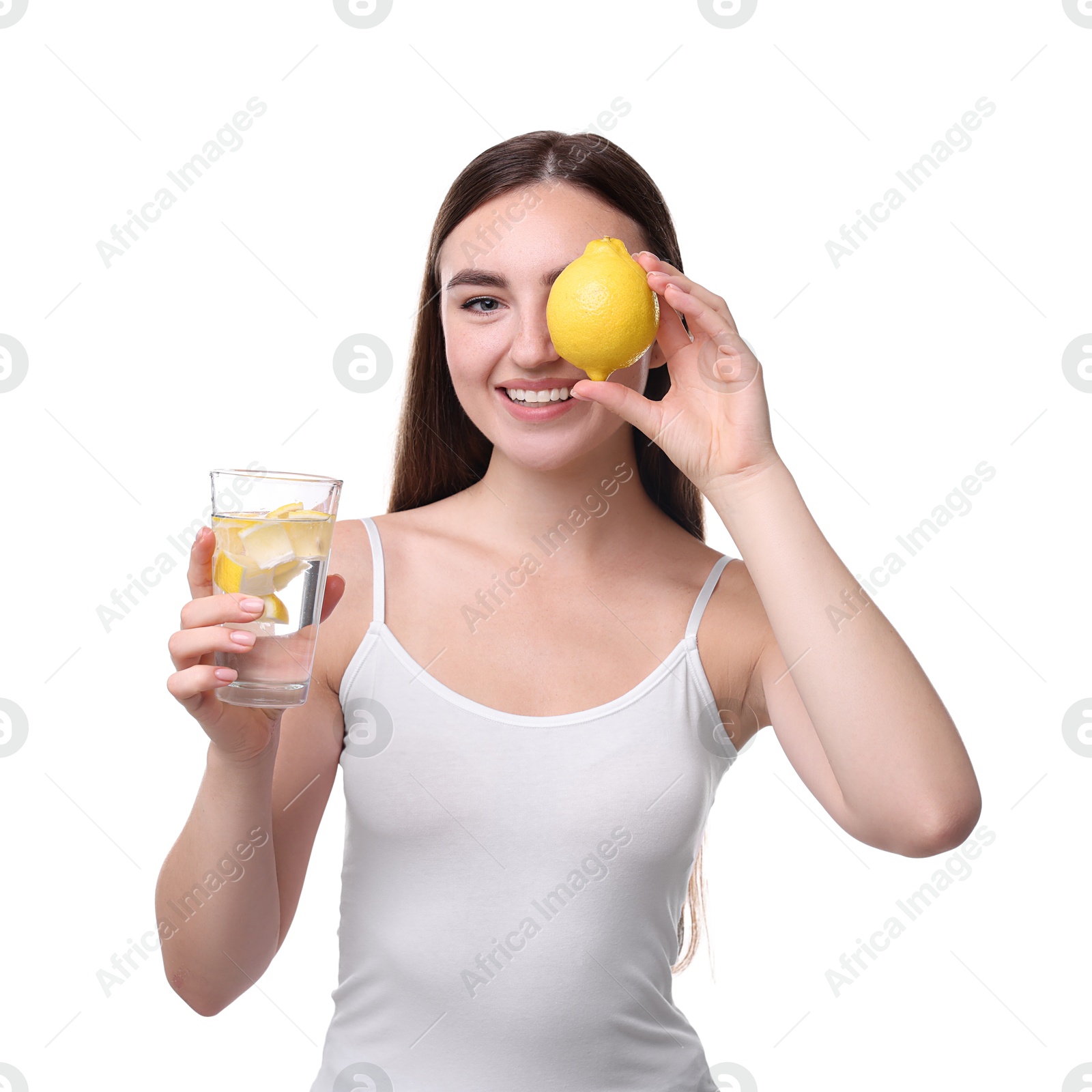 Photo of Woman with glass of lemon water and fruit on white background