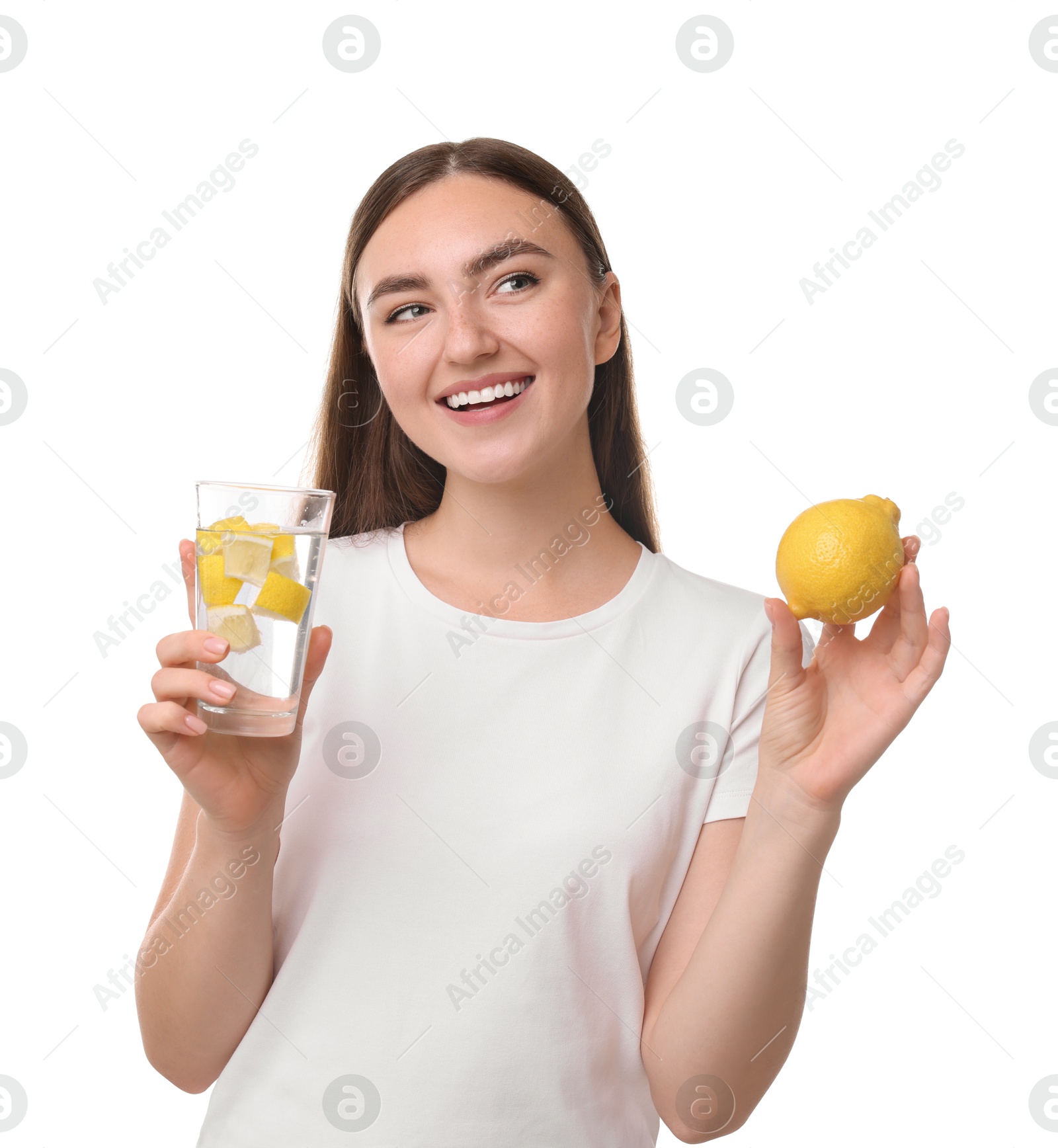 Photo of Woman with glass of lemon water and fruit on white background