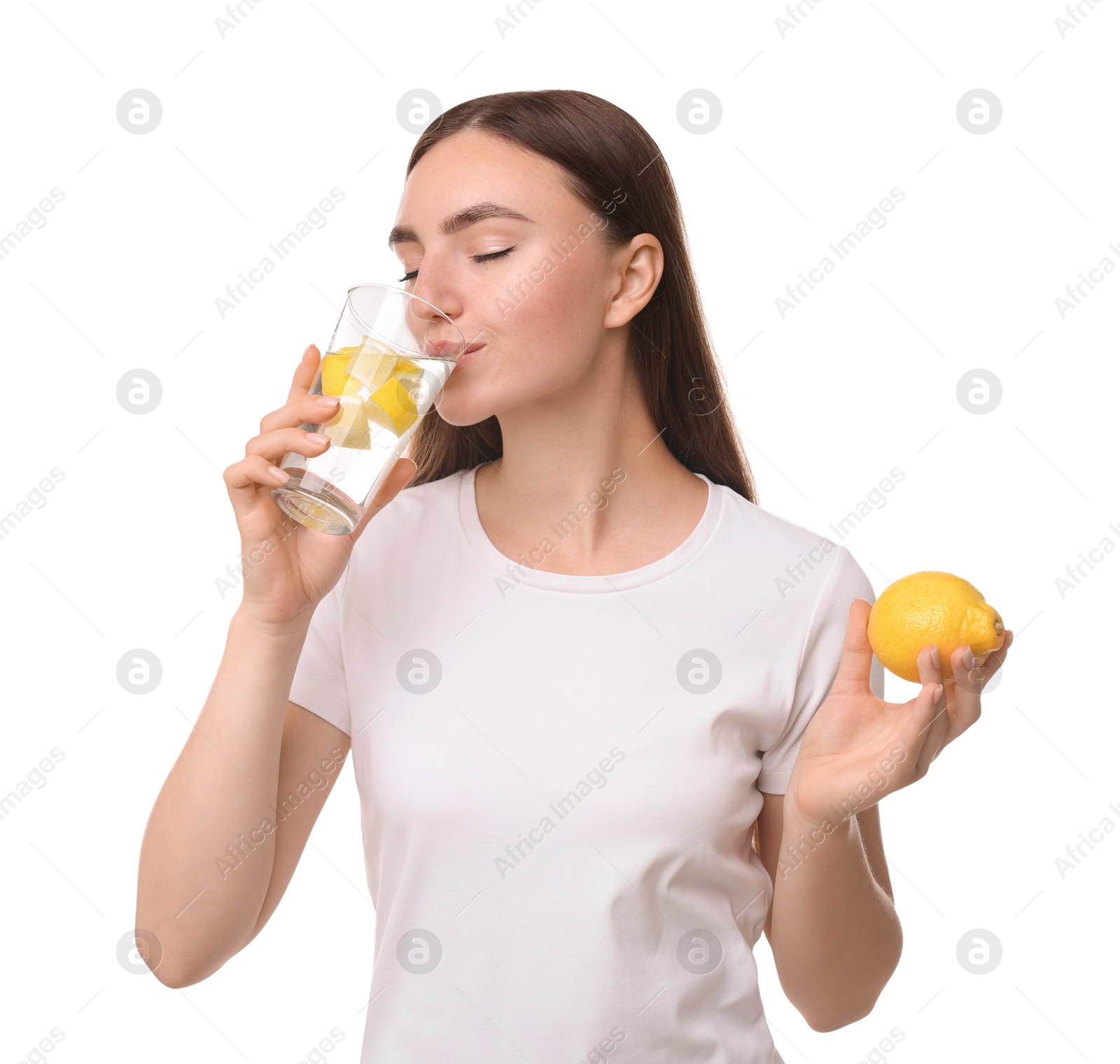 Photo of Woman drinking water with lemon on white background