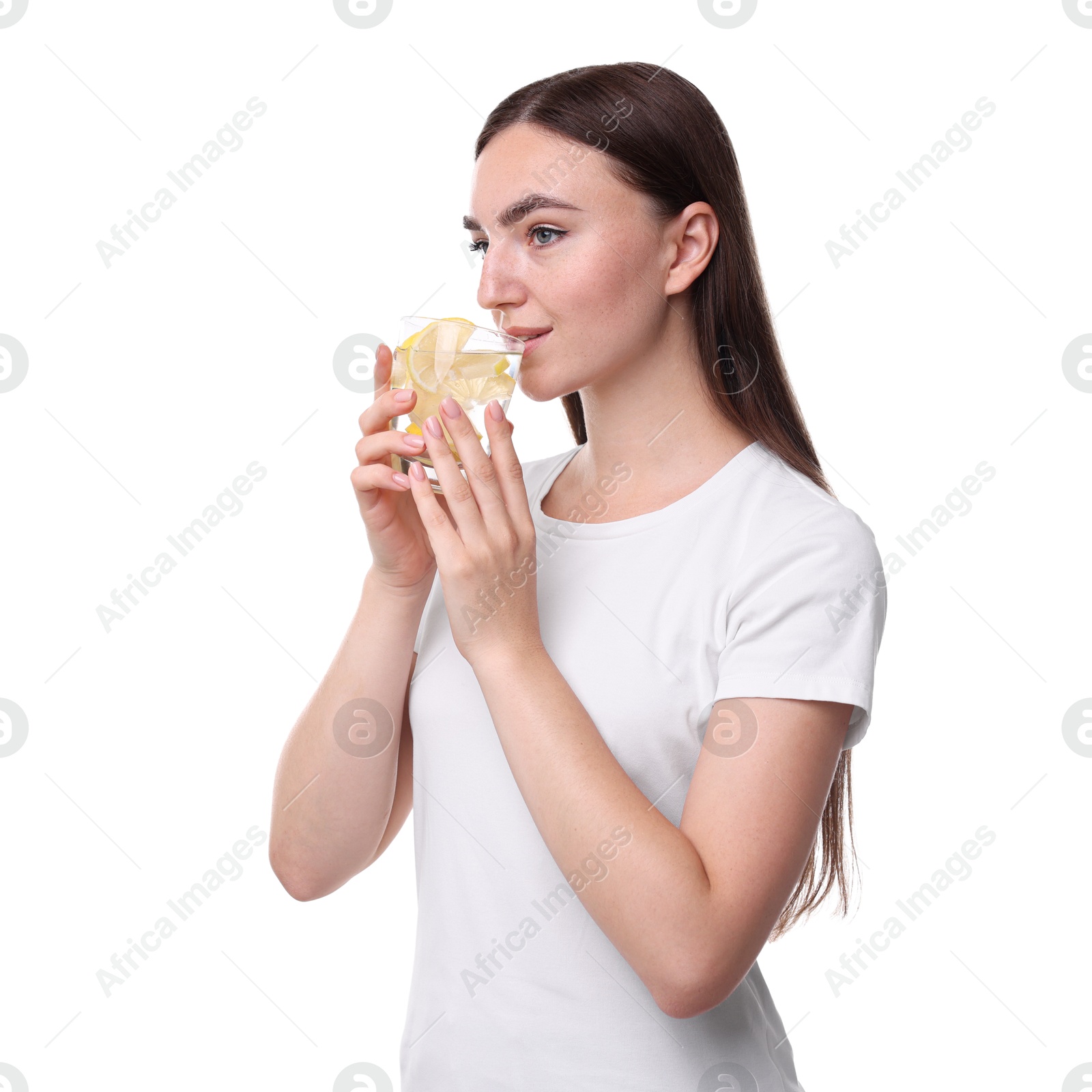 Photo of Woman drinking water with lemon on white background