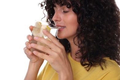 Photo of Woman drinking water with lemon on white background, closeup