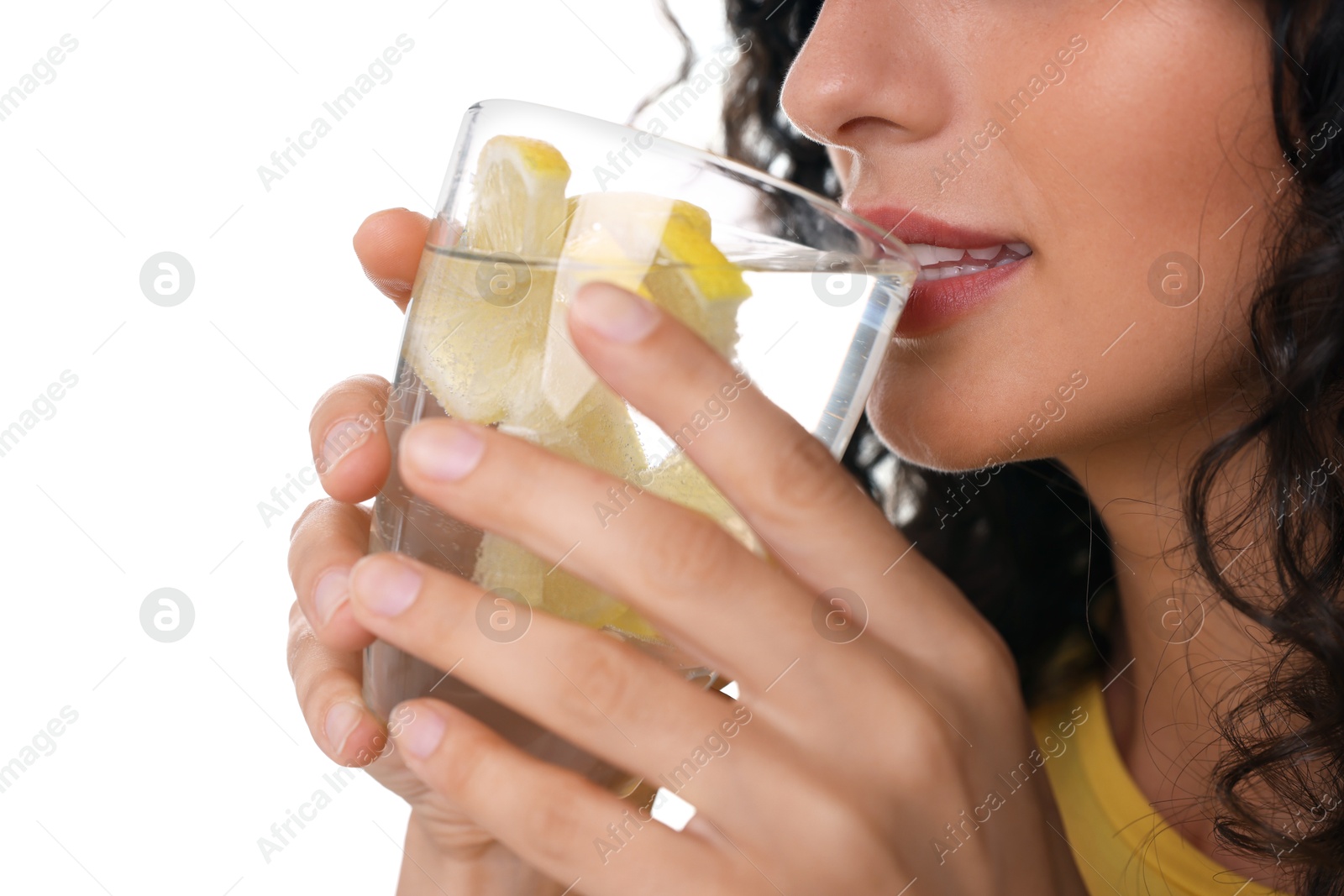 Photo of Woman drinking water with lemon on white background, closeup