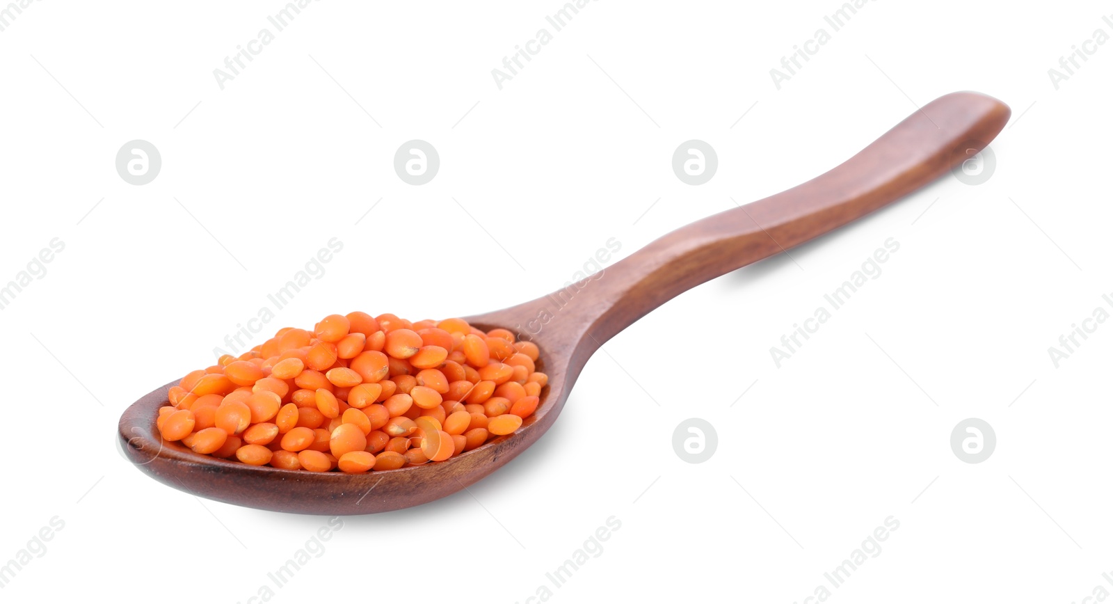 Photo of Raw lentils in spoon isolated on white