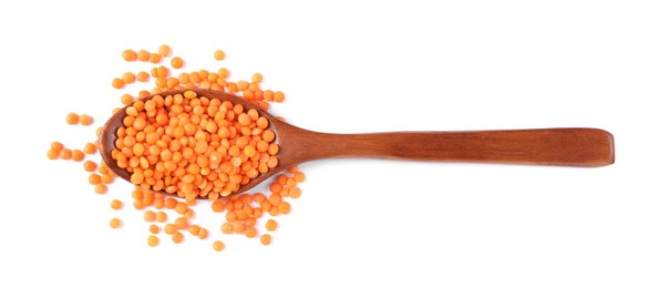 Photo of Raw lentils in spoon isolated on white, top view