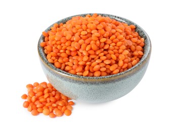 Photo of Raw lentils in bowl isolated on white