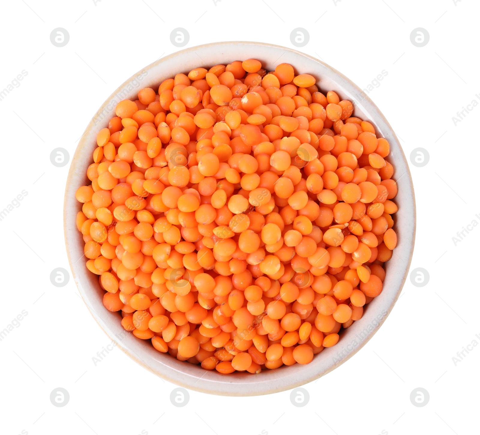 Photo of Raw lentils in bowl isolated on white, top view