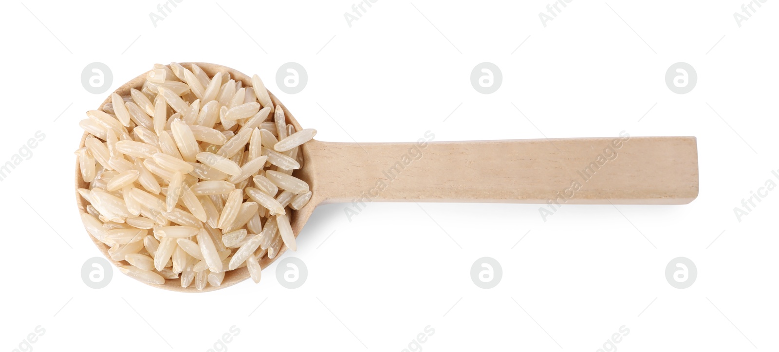 Photo of Raw rice in wooden spoon isolated on white, top view