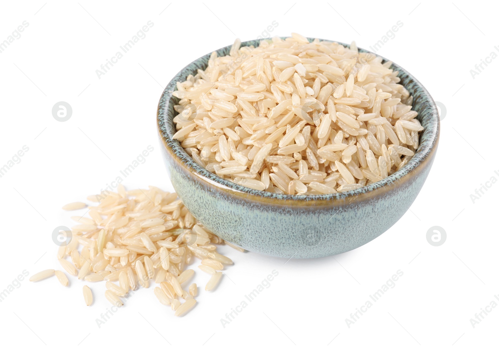 Photo of Raw rice in bowl isolated on white