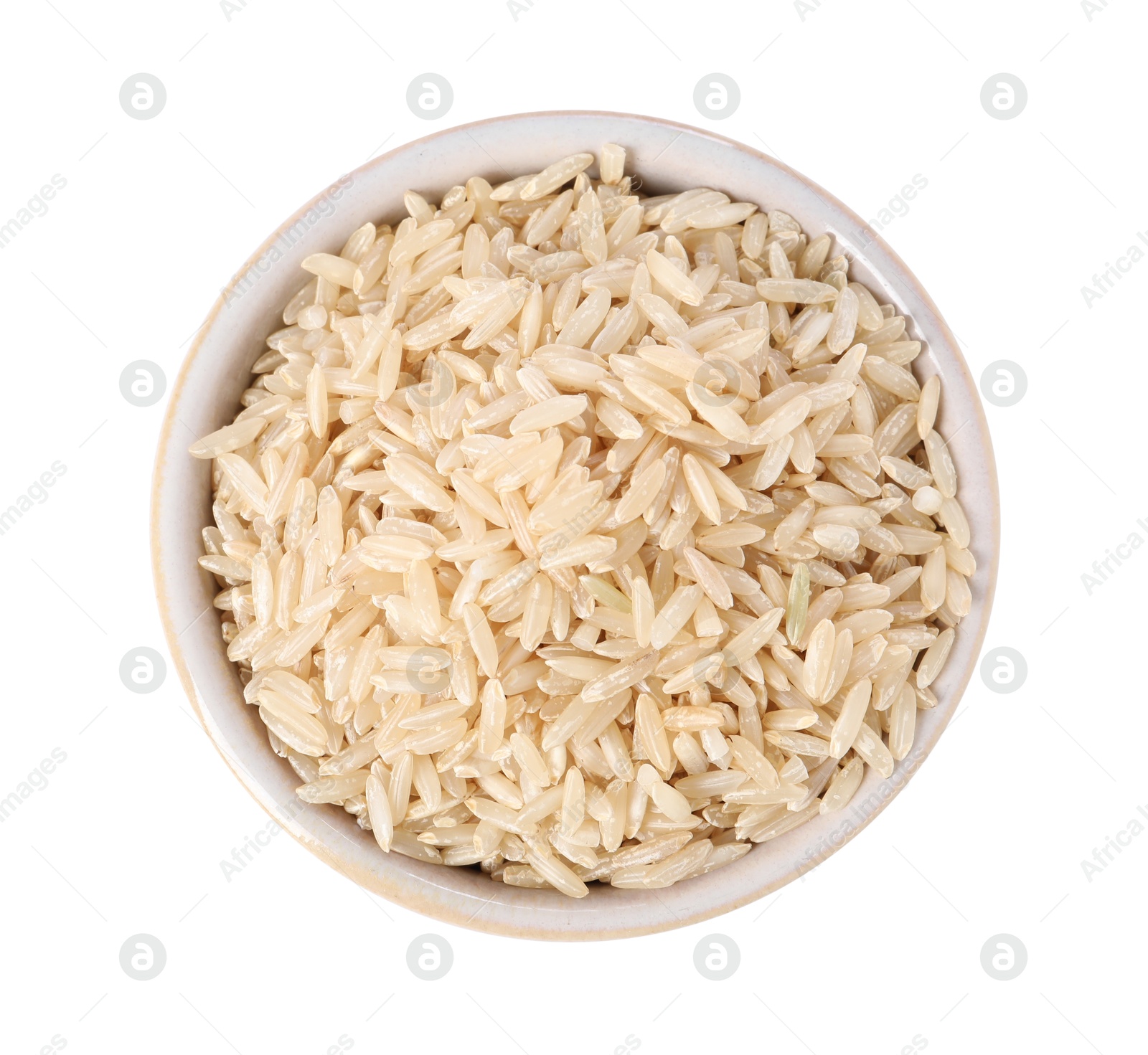 Photo of Raw rice in bowl isolated on white, top view