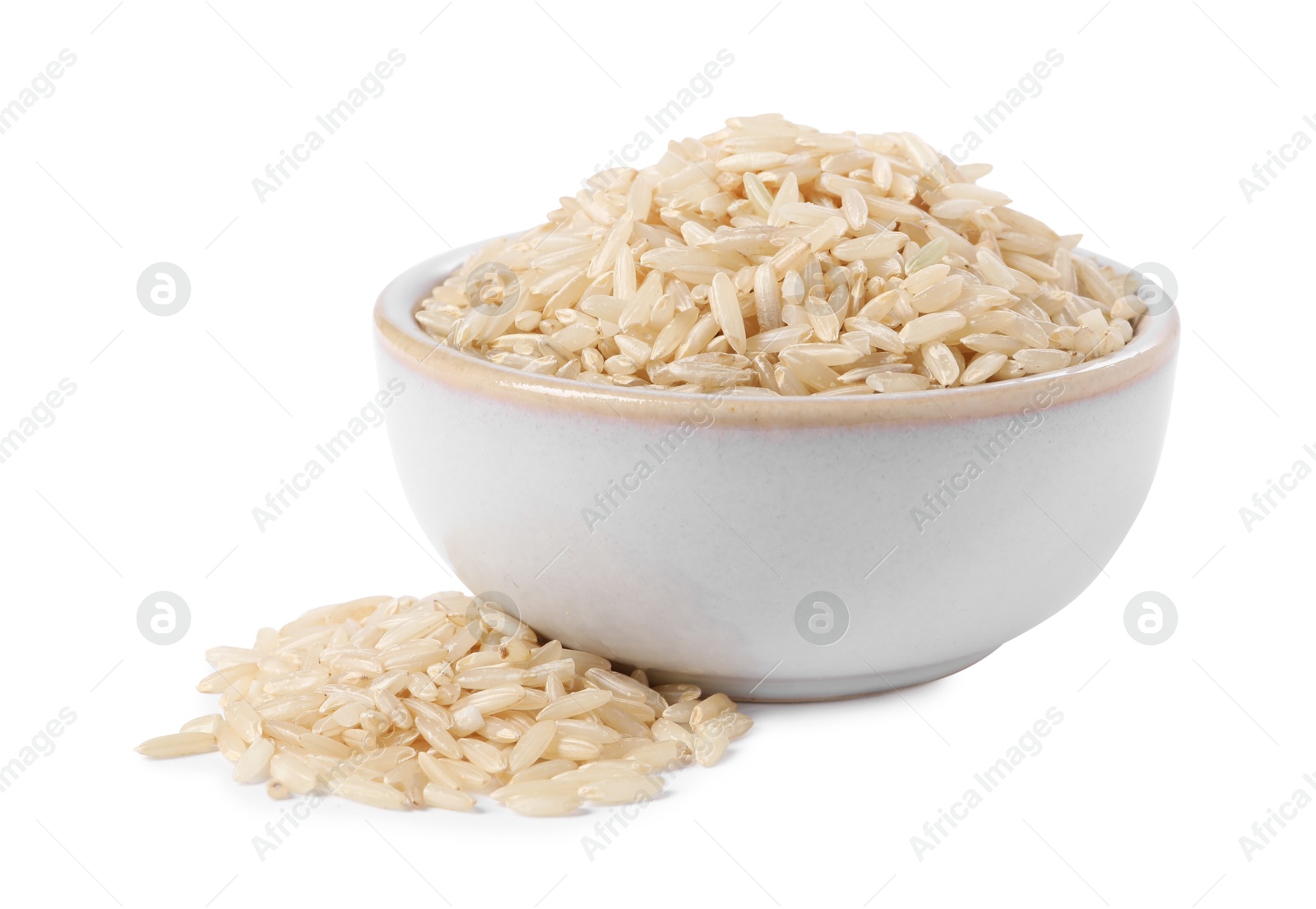 Photo of Raw rice in bowl isolated on white