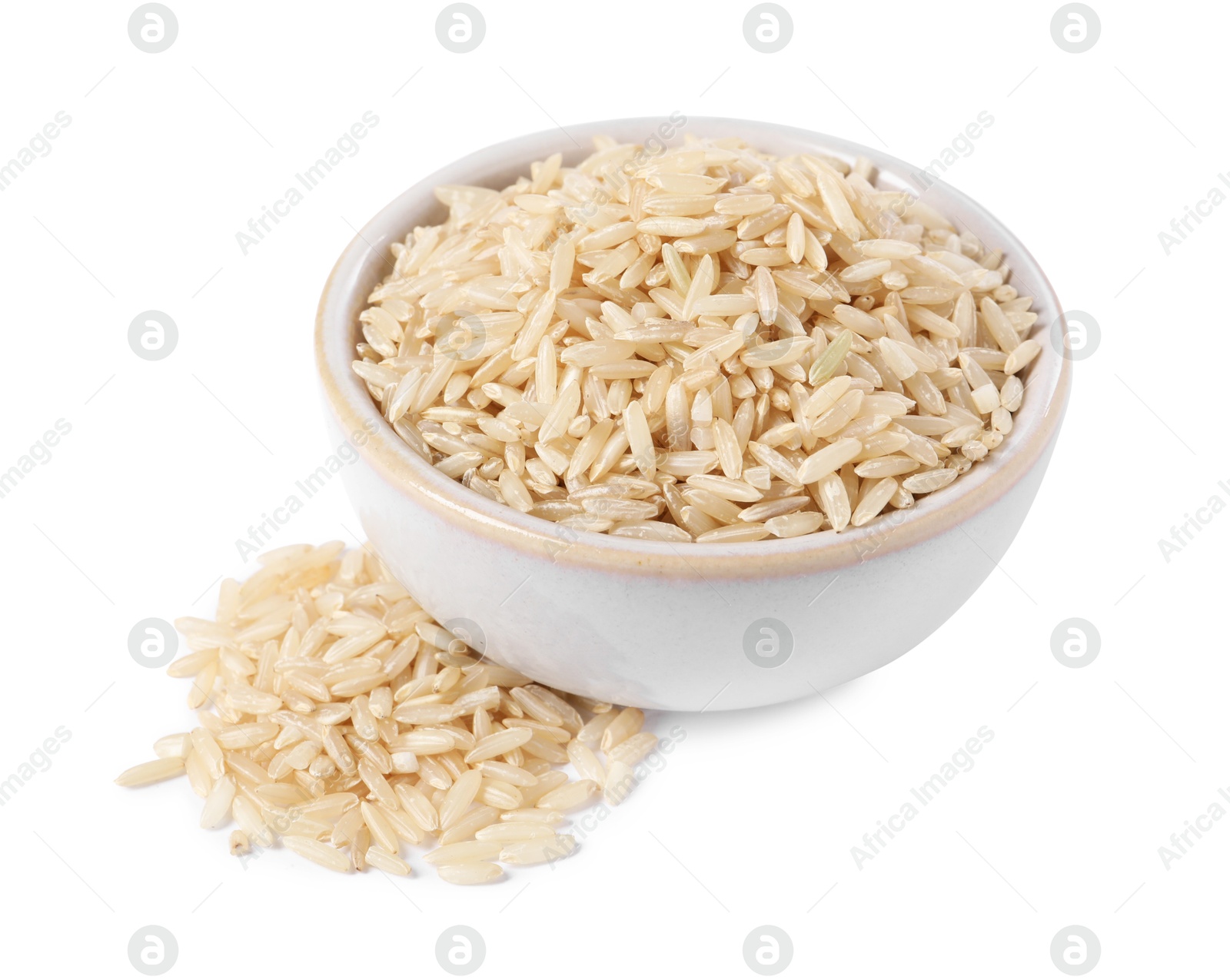 Photo of Raw rice in bowl isolated on white