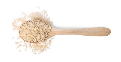 Photo of Raw rice in wooden spoon isolated on white, top view