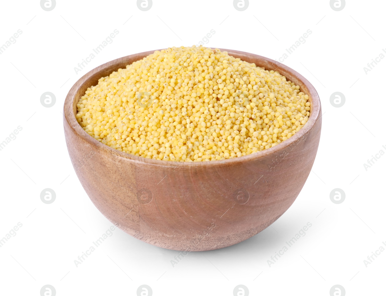 Photo of Millet groats in wooden bowl isolated on white