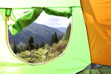 Beautiful view of mountains through camping tent window