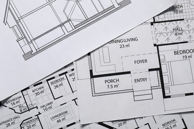 Photo of Different engineering drawings as background, top view