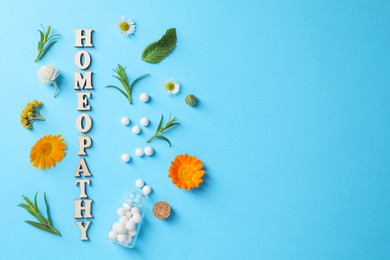 Photo of Word Homeopathy, medicinal herbs and pills on light blue background, flat lay. Space for text