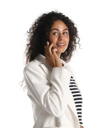 Beautiful woman in stylish jacket talking on smartphone against white background