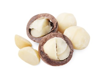 Macadamia nuts with shells isolated on white