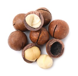 Macadamia nuts with shells isolated on white, top view