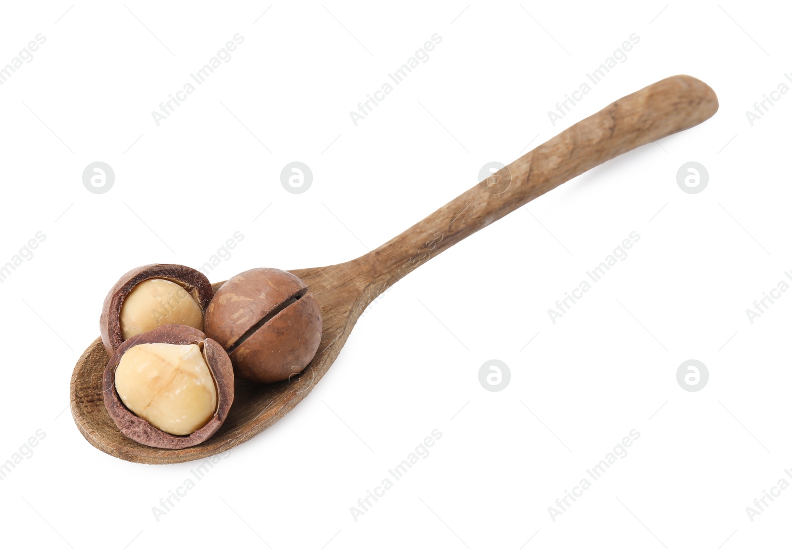 Photo of Spoon with macadamia nuts isolated on white