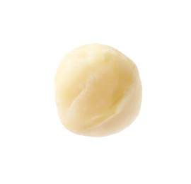 Photo of One peeled macadamia nut isolated on white