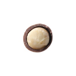 One macadamia nut with shell isolated on white