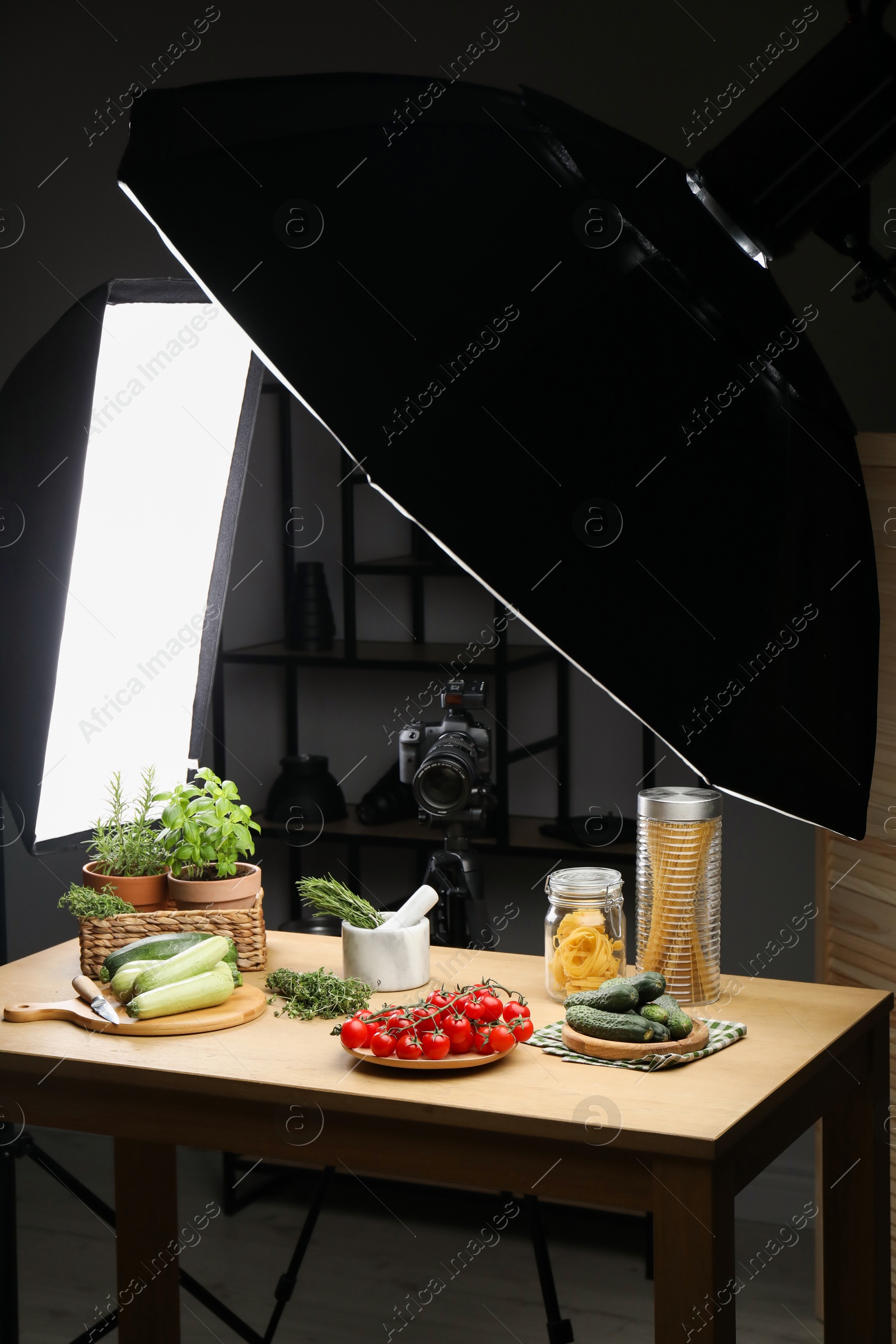 Photo of Shooting food in photo studio with professional lighting equipment