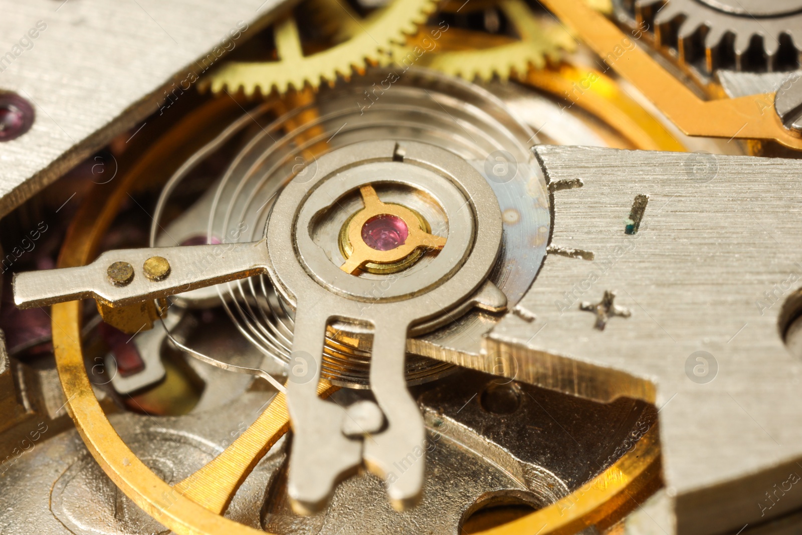 Photo of Mechanism of vintage wrist watch as background, closeup