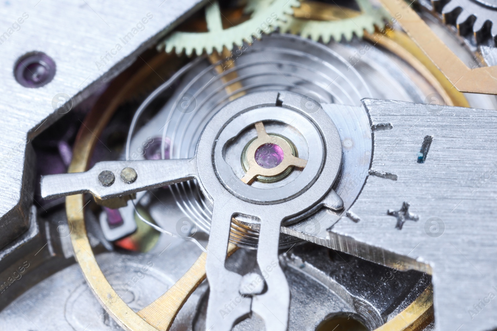 Photo of Mechanism of vintage wrist watch as background, closeup