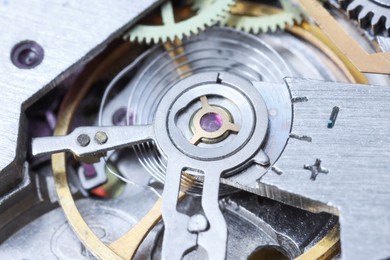 Photo of Mechanism of vintage wrist watch as background, closeup