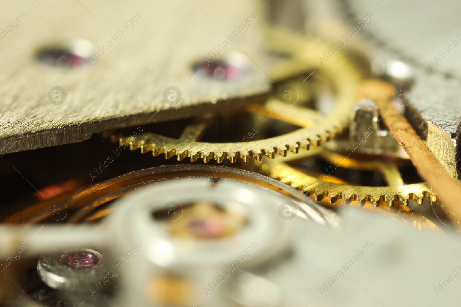 Photo of Mechanism of vintage wrist watch as background, closeup