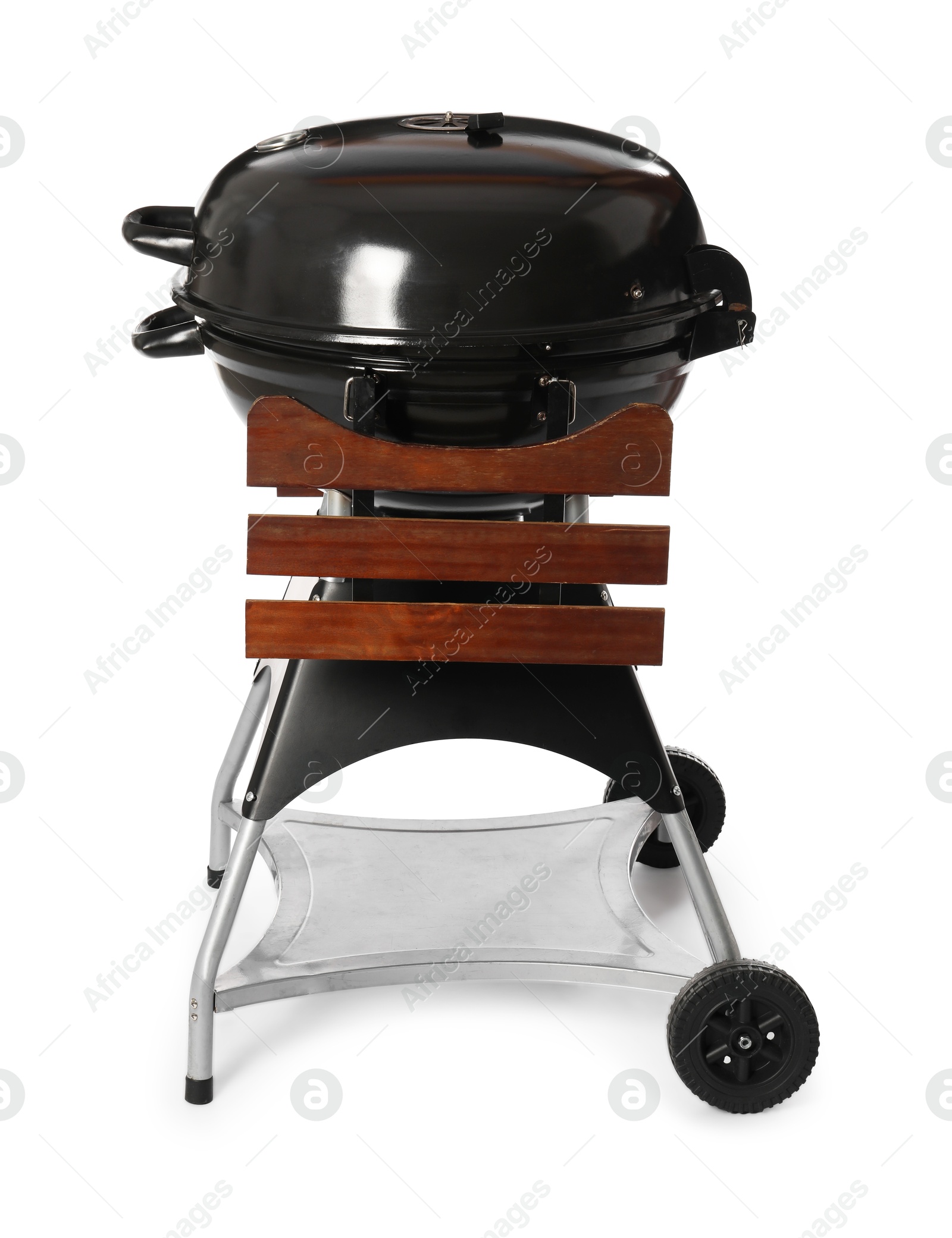 Photo of One black barbeque grill isolated on white. Cooking appliance